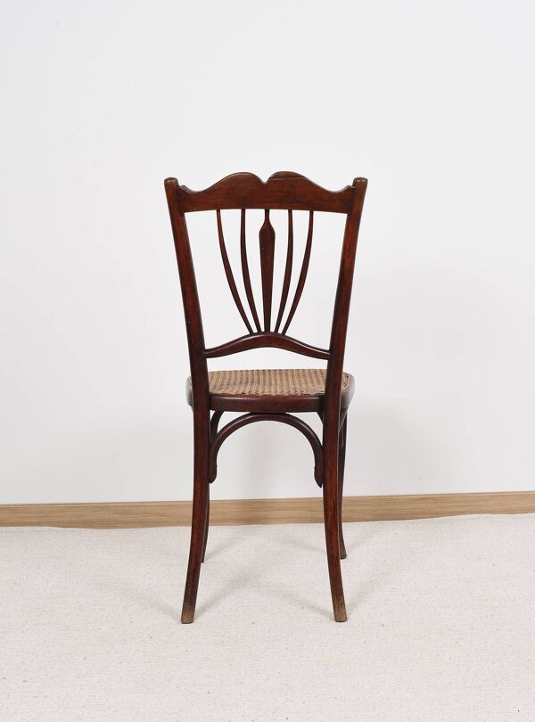 Ancienne chaise de bistrot en cannage, estampillée fischel