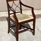 English Sheraton-style mahogany dining room set from the 20th century.