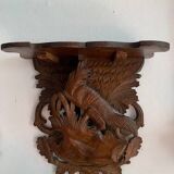 Black Forest carved wooden wall console, harness with wolf decoration
