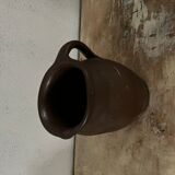 Pitcher in ancient earth