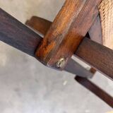 Antique folding chair with weaved seat/back