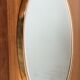 Free-form oval sheathed mirror from the 60s and 70s