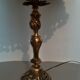 Lampe pied en bronze doré abat jour plissé