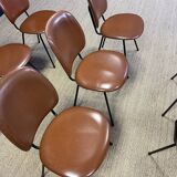 Set of 8 retro bistro chairs in cognac leatherette and black steel legs