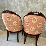 Pair of carved solid mahogany gondolas from the 19th century