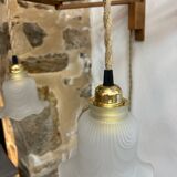 Two portable lamps with wall mount.