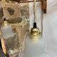 Two portable lamps with wall mount.