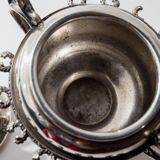 Vintage 1930s silver-plated footed bowl with lid by Warren Rogers New York, featuring a bird motif and ornate details.