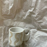 Mug type cup in white glazed stoneware wave