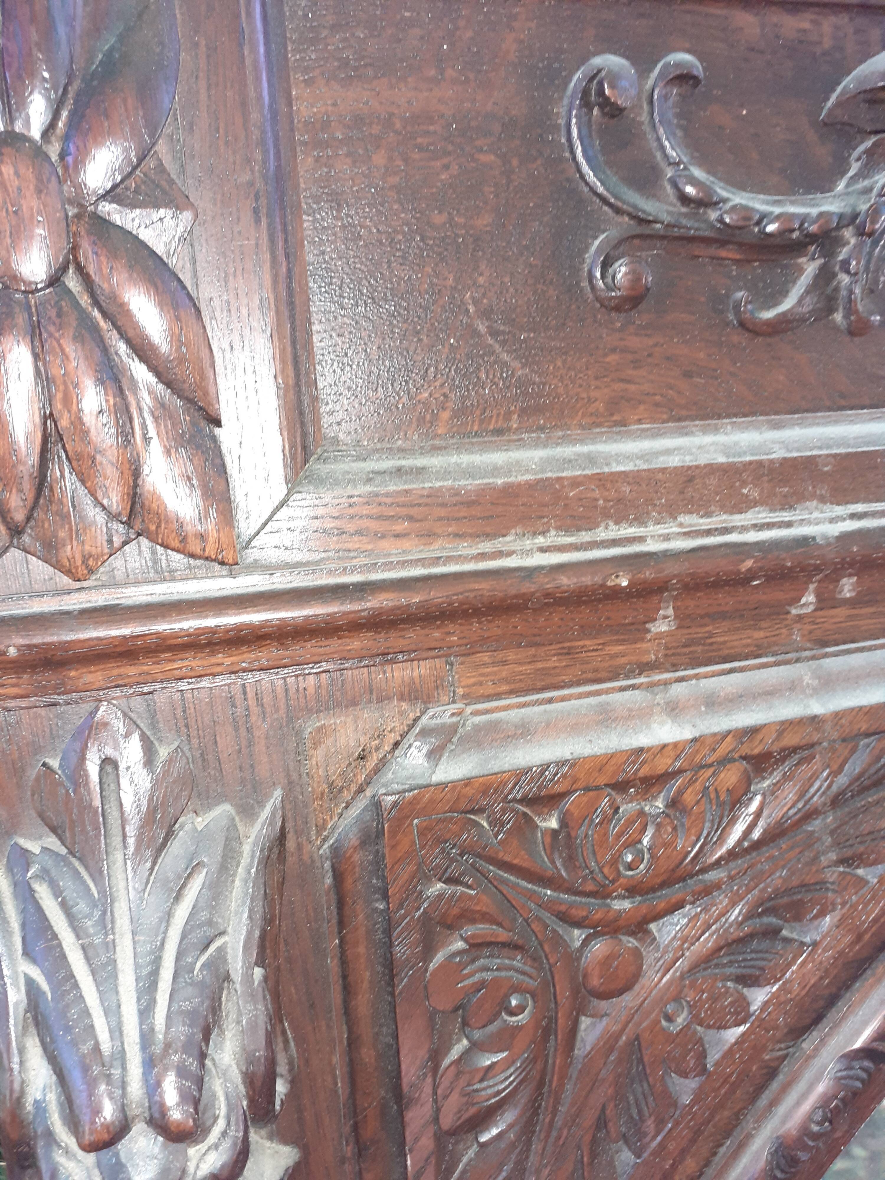 Trumeau mirror beveled in carved oak 104x144cm