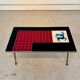 Vintage 70s coffee table – red & black graphic top – laito