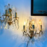 Pair of bronze wall lights and crystal pendants