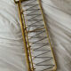 Vintage wall coat rack in gilded metal