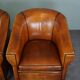 Set de 2 fauteuils Art Déco en cuir de mouton passepoil noir
