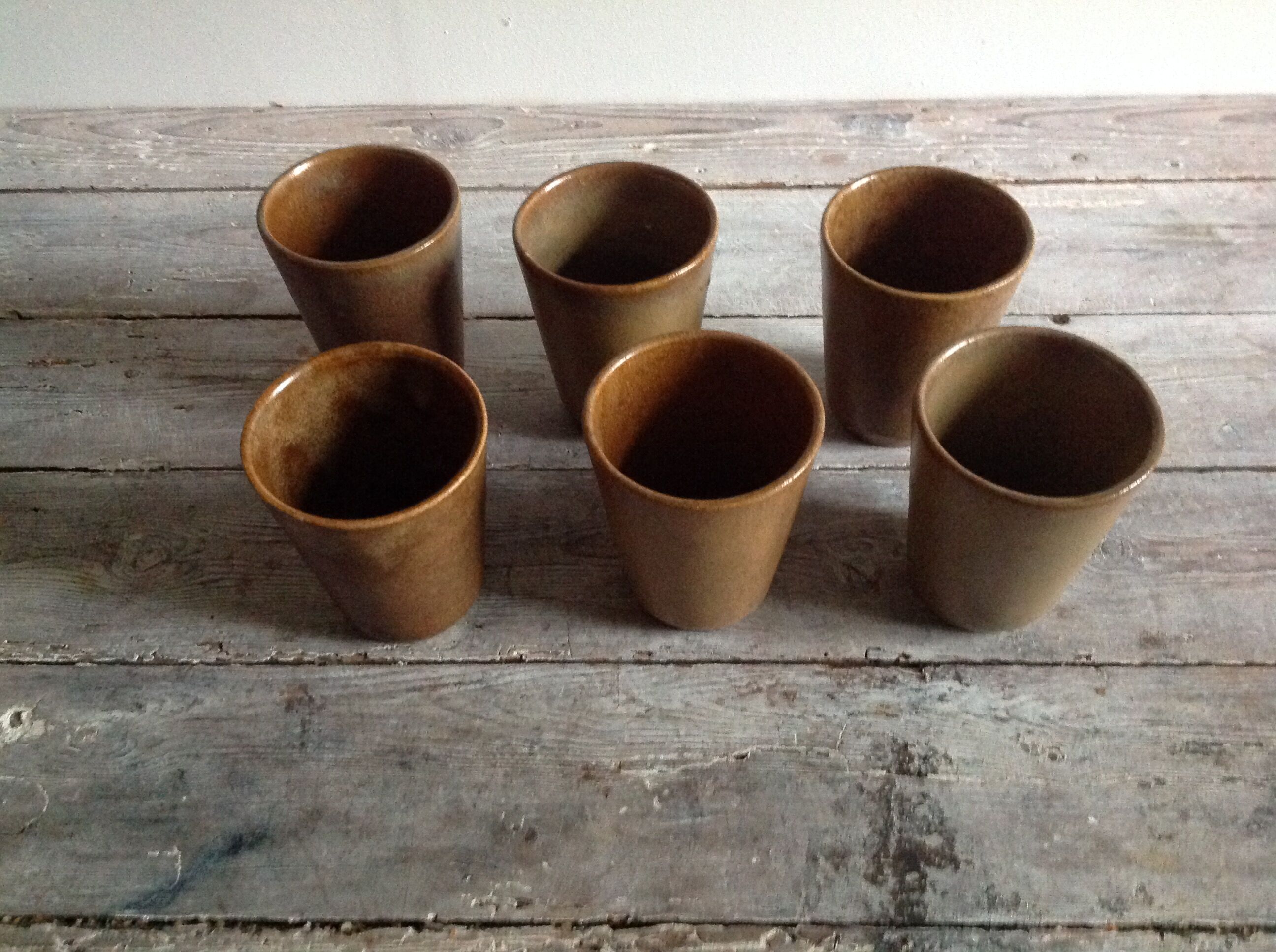 Series of 6 sandstone cups