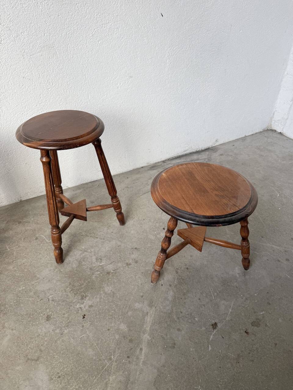 Set of 4 turned oak stools.