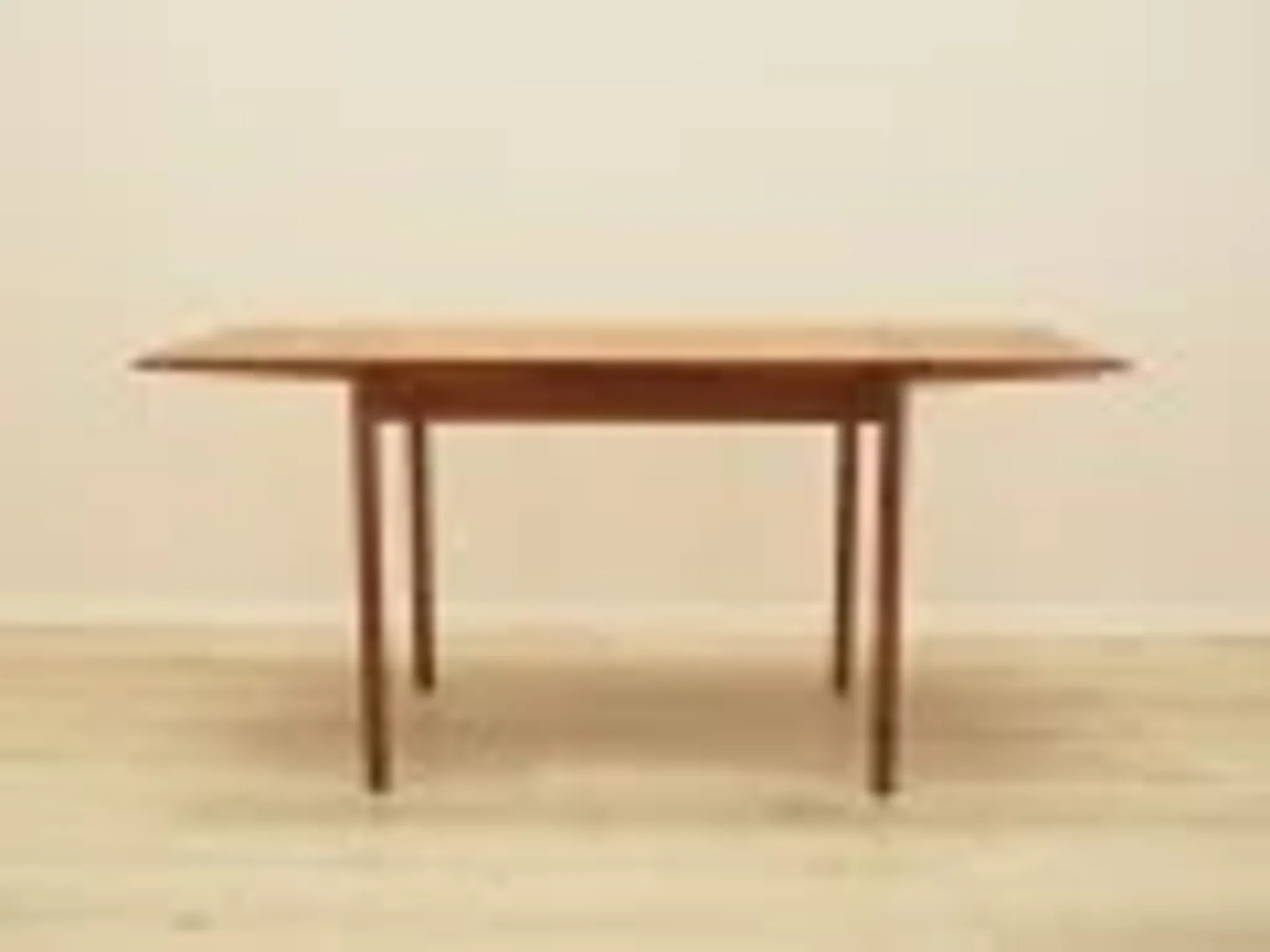 Danish teak extending dining table on solid wood legs, 1970s