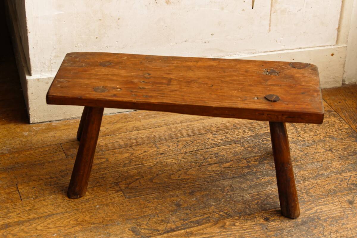Low solid wood bench, folk art