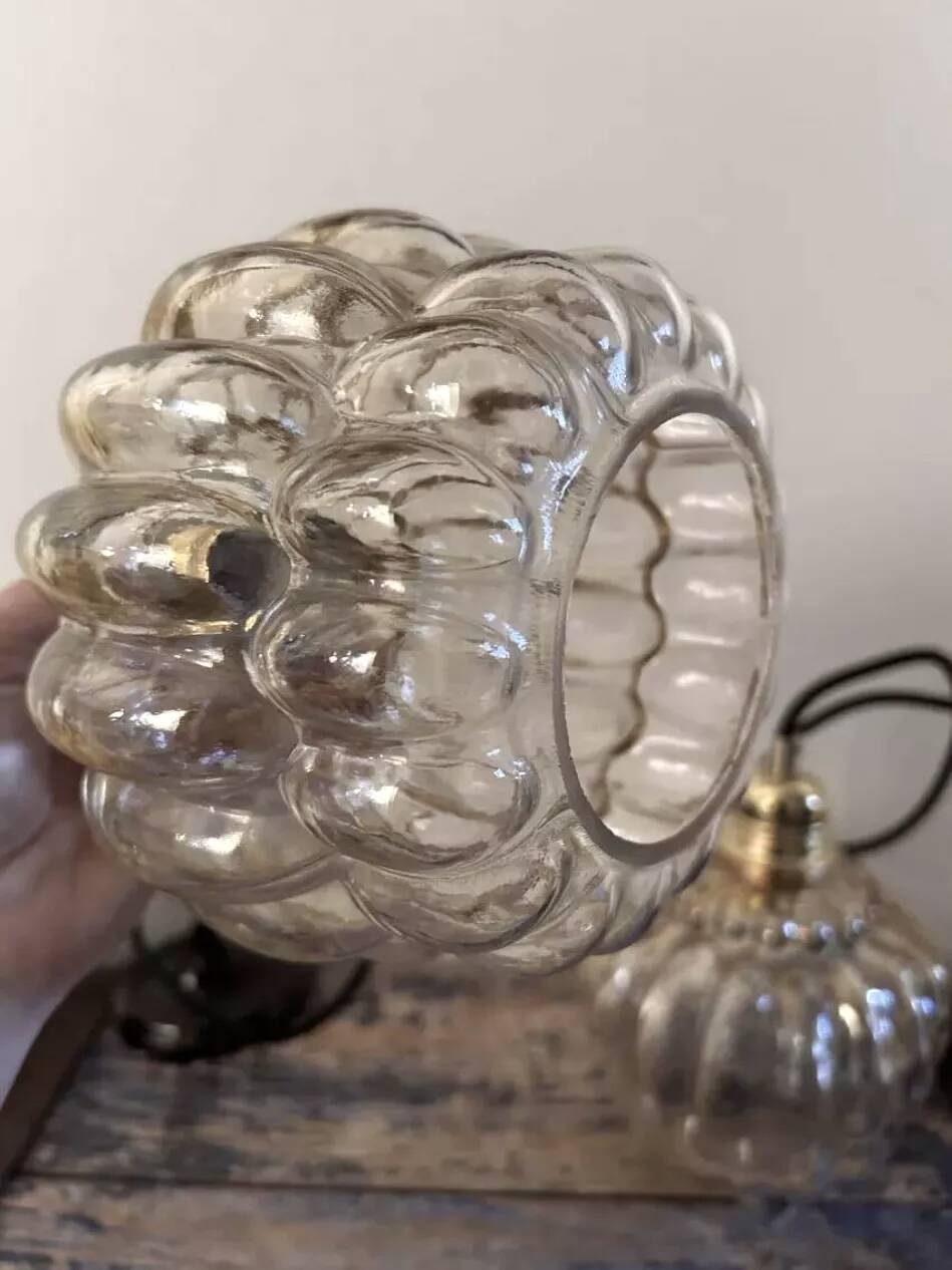 Pair of vintage amber glass pendant lights