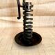 Spiral rat cave candlestick in wrought iron