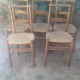 Set of five straw church chairs
