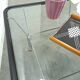 Glazen jaren 70 salontafel met chromen onderstel vintage