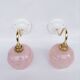 pair of vintage speckled pink and brass wall lights