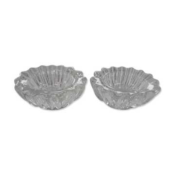 Antique crystal salt and pepper shakers, with their small spoon