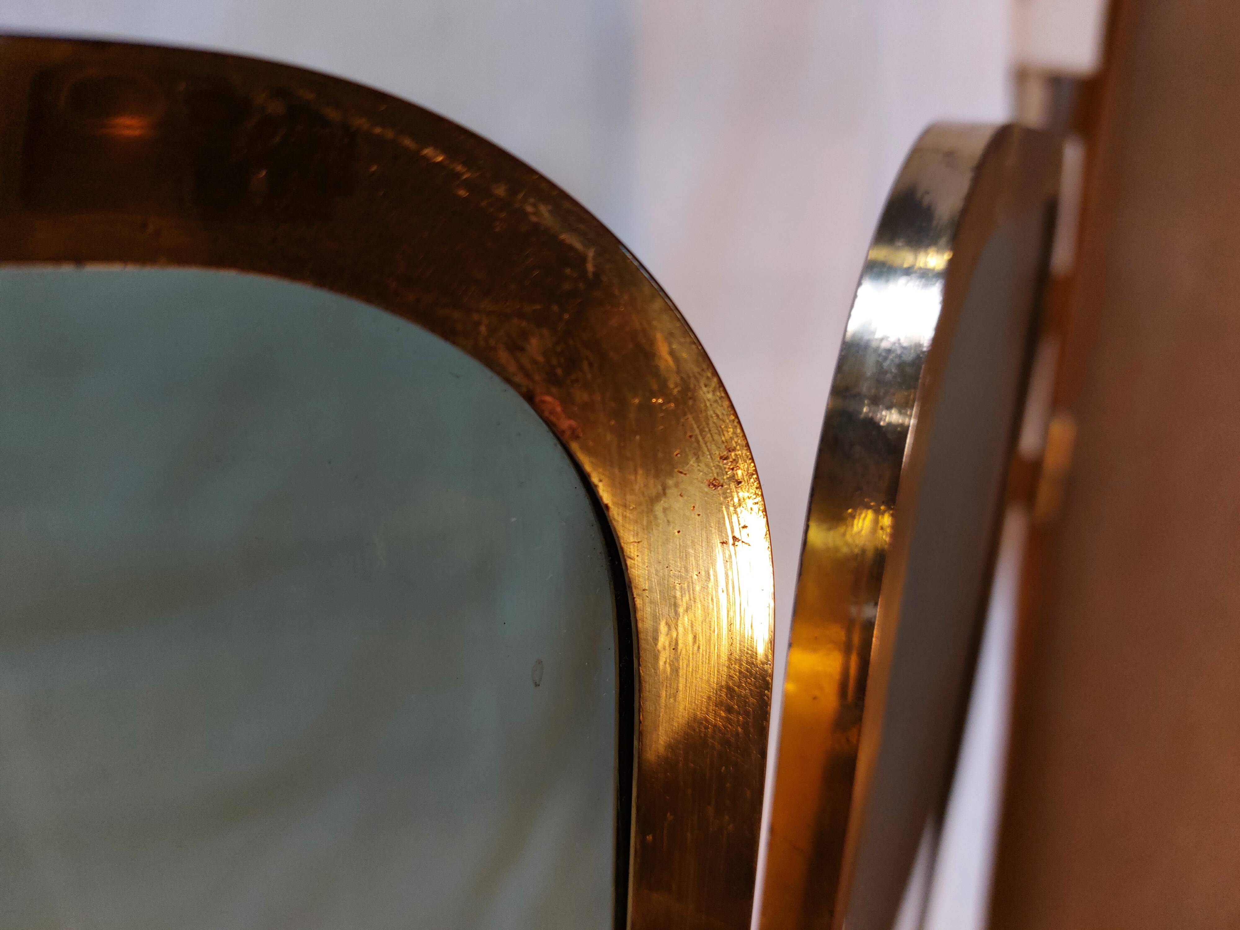 Vintage fireplace screen in smoked glass and gold-tone metal