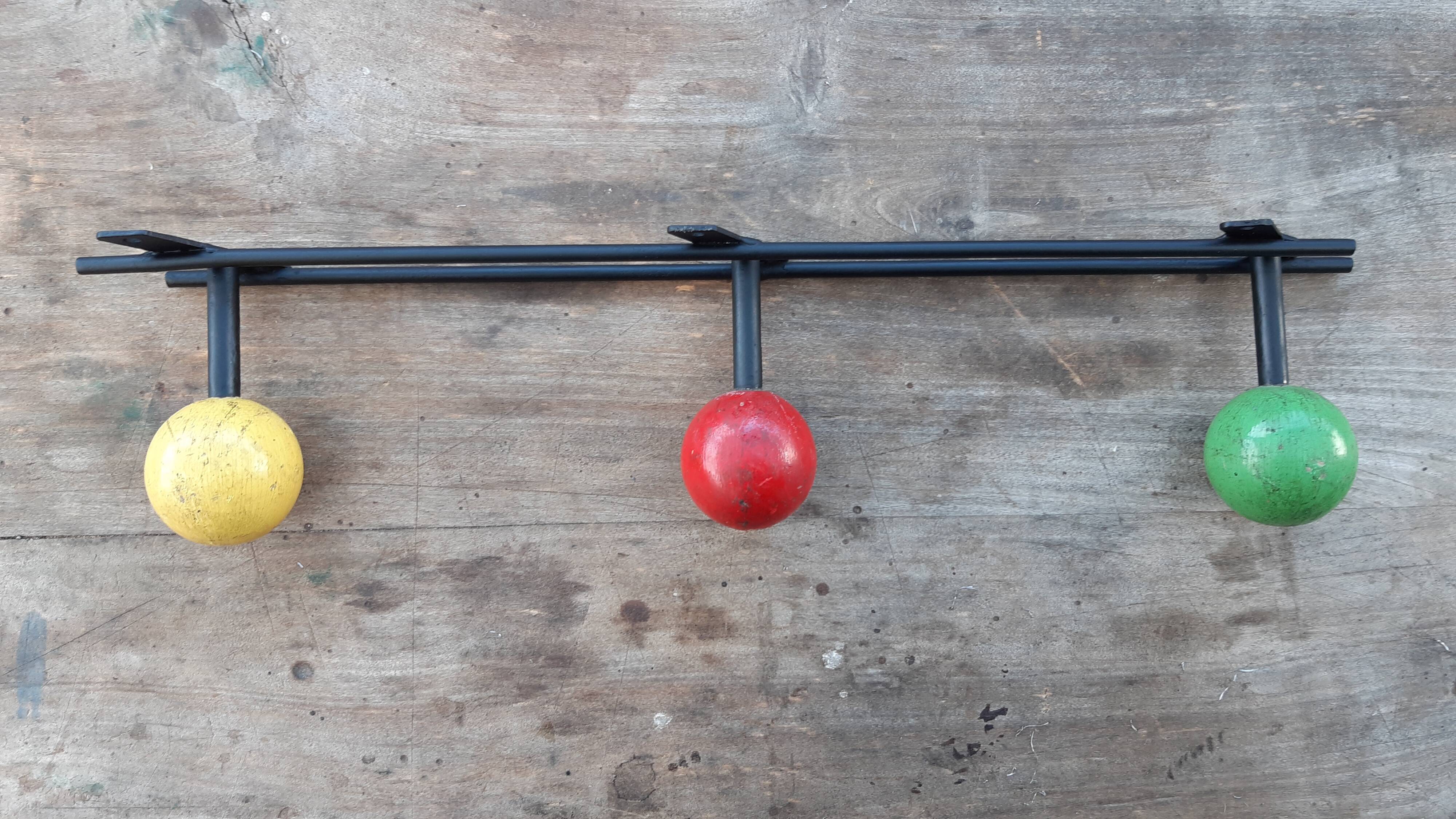 Vintage ball coat holder