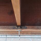 Workshop furniture with drawers and curtain in beech and walnut.