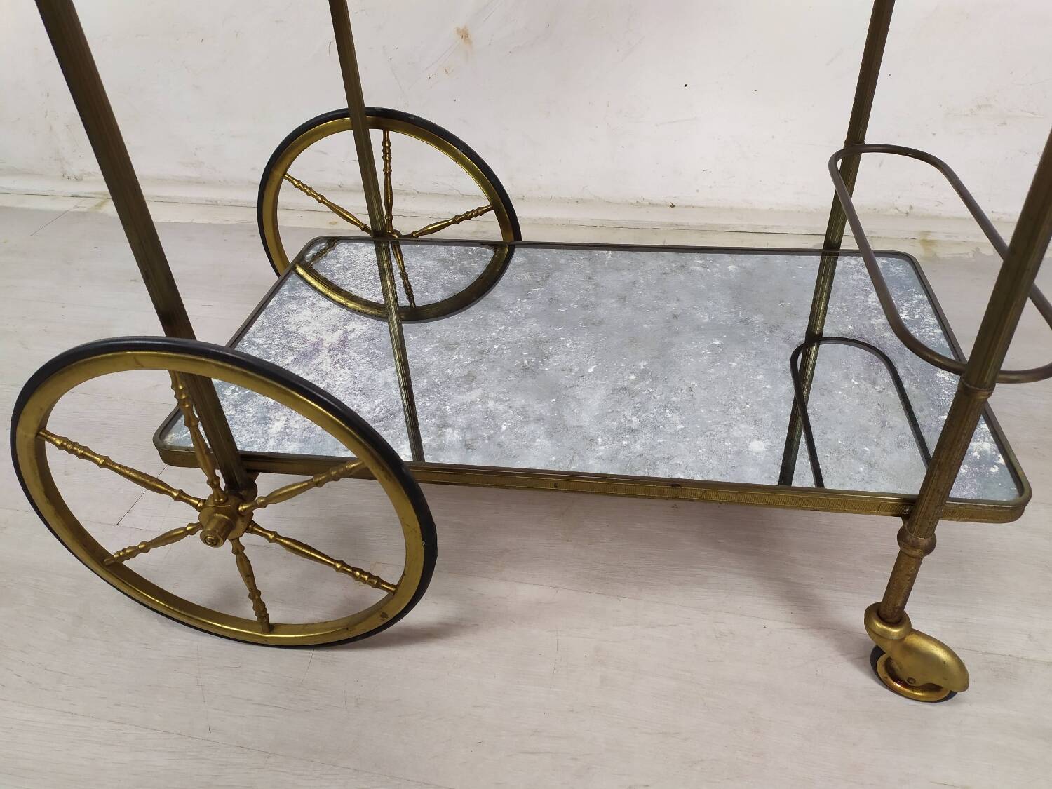 Brass and glass rolling trolley