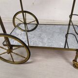 Brass and glass rolling trolley
