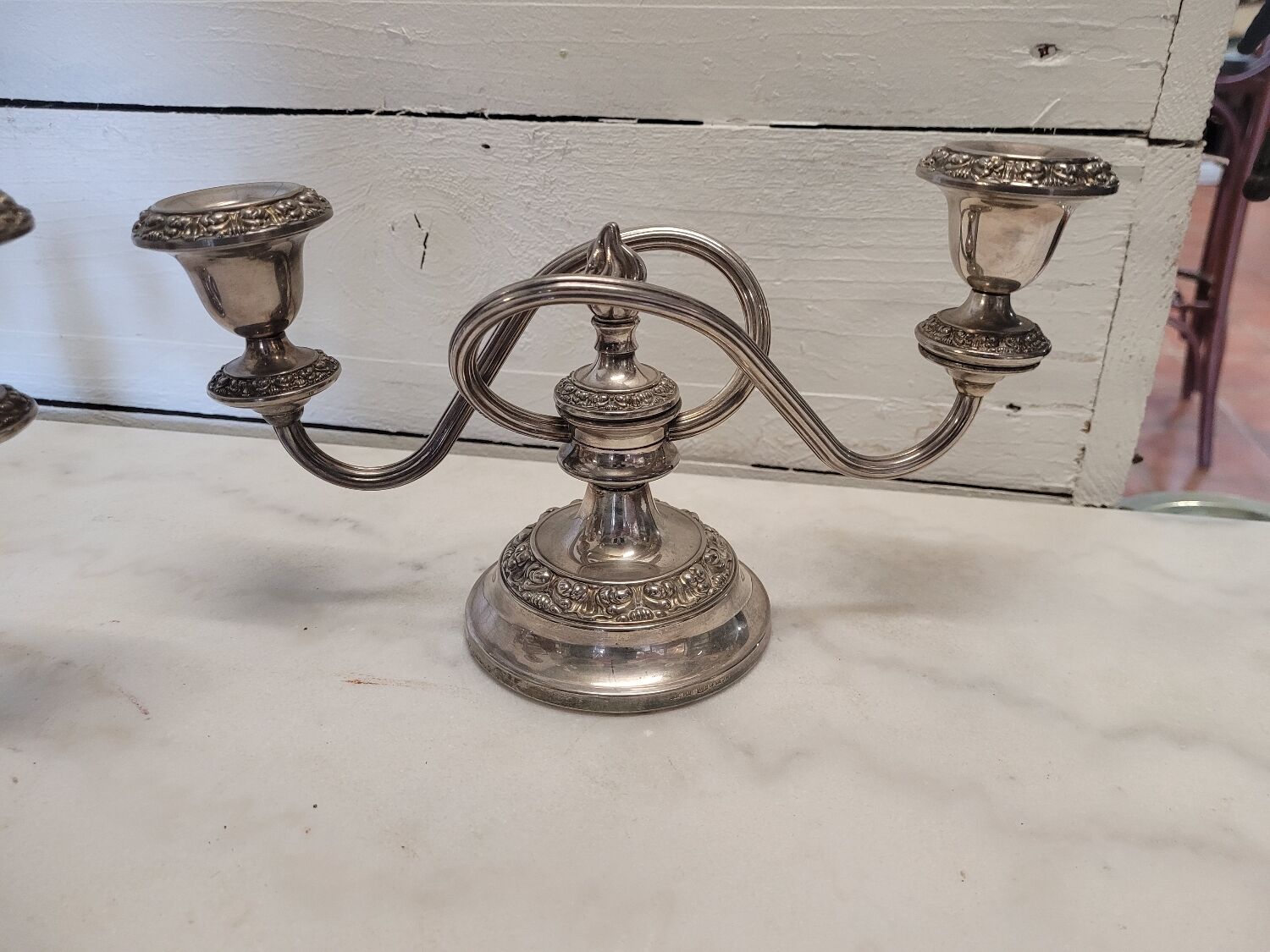 Pair of silver metal candlesticks