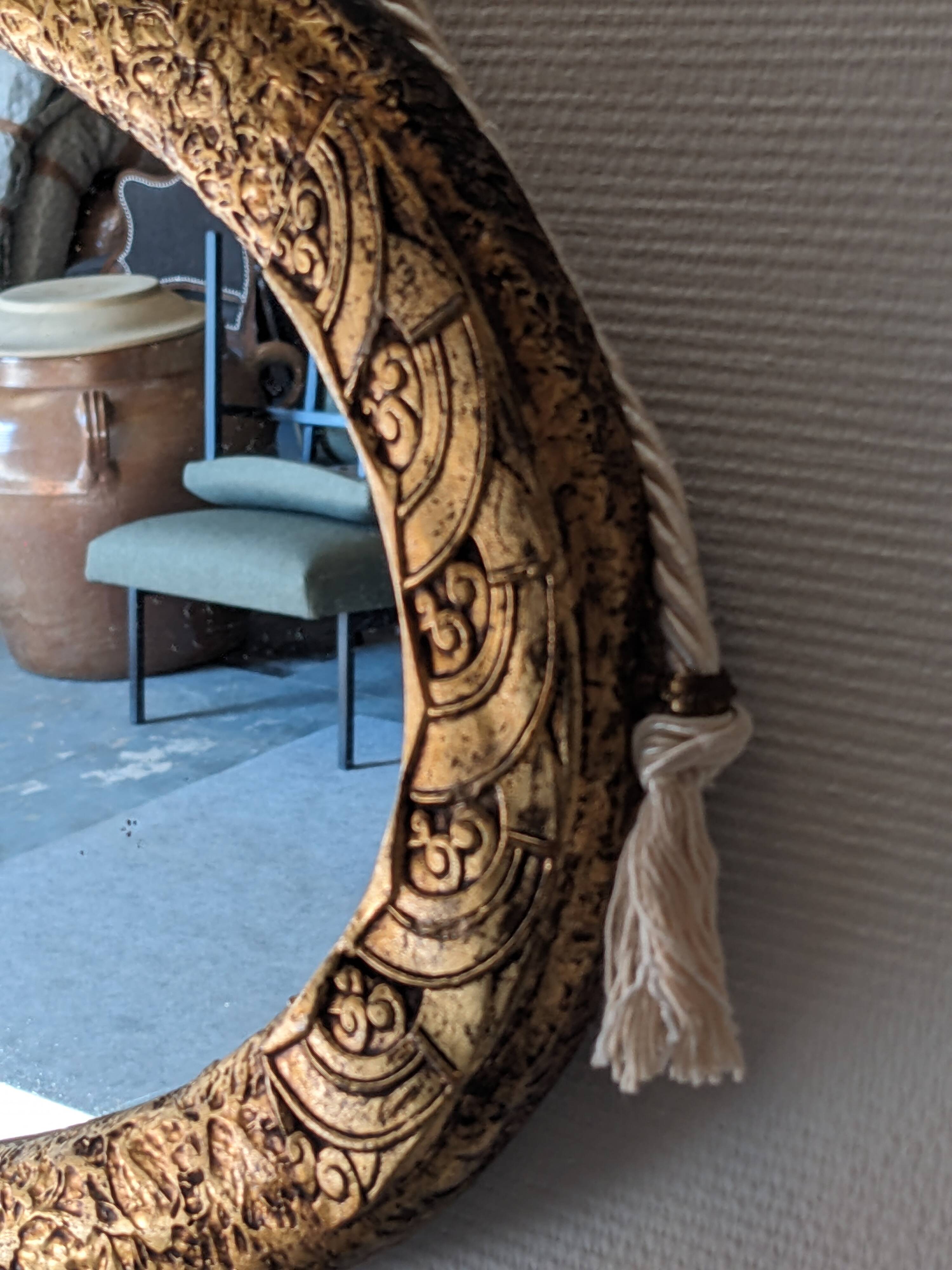 Miroir ovale Art déco en bois doré vers 1920