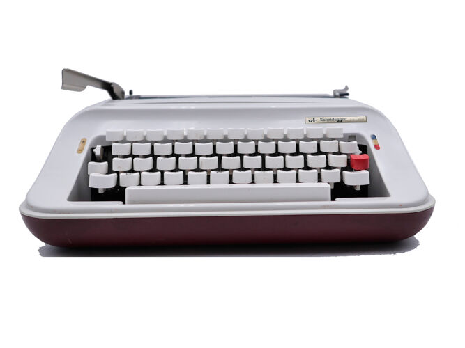 Machine à écrire Olivetti Scheidegger président bordeaux et blanche révisée ruban neuf