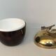 Apple-shaped ice bucket in red celluloid, gold-tone metal and plastic