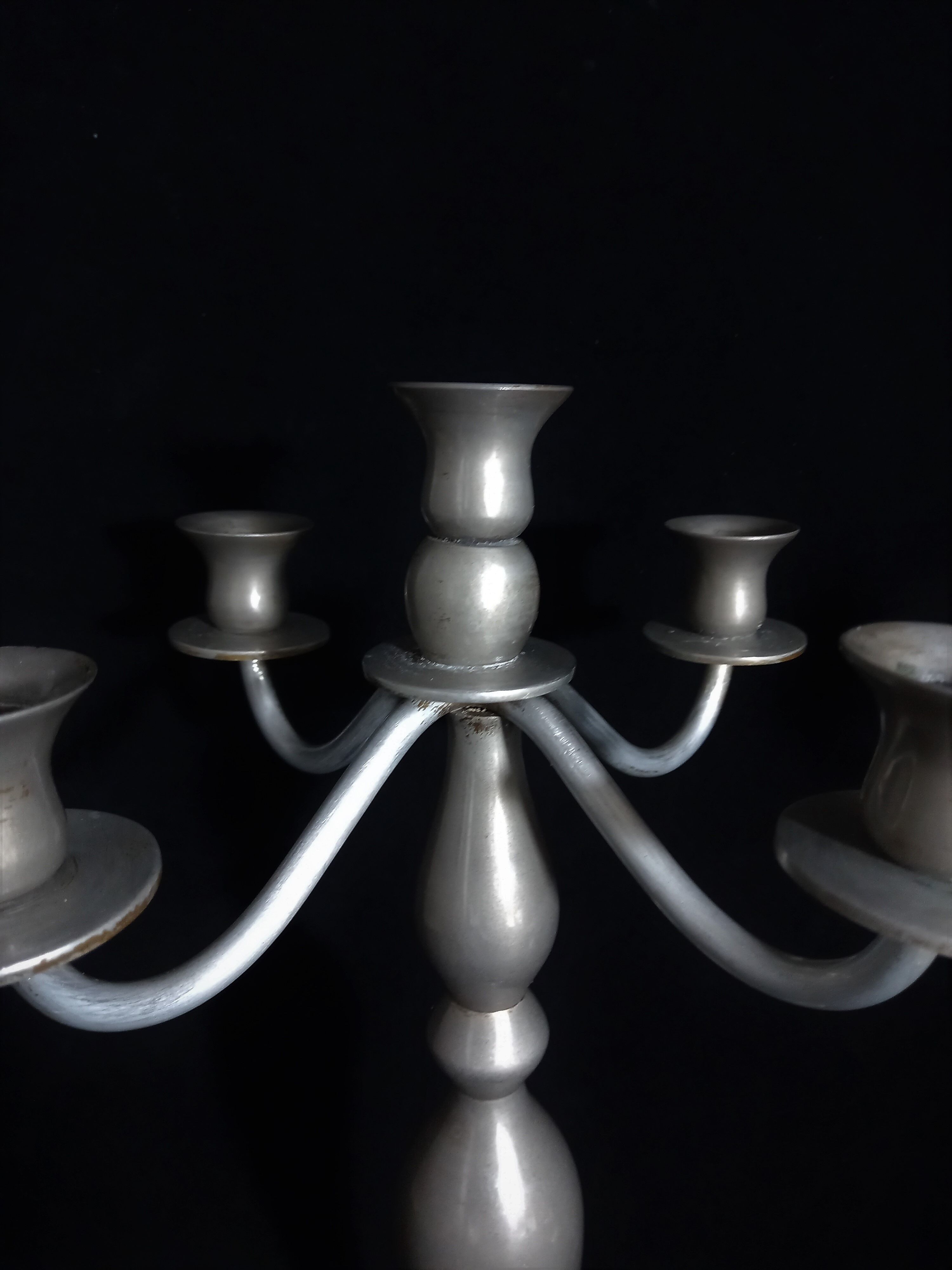 Metal candelabras with five arms