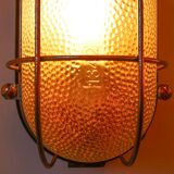 Old wall lamp in mesh hammered glass