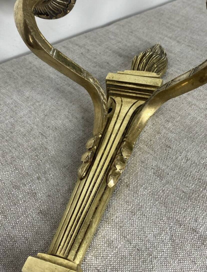 Pair of wall candle holders in bronze