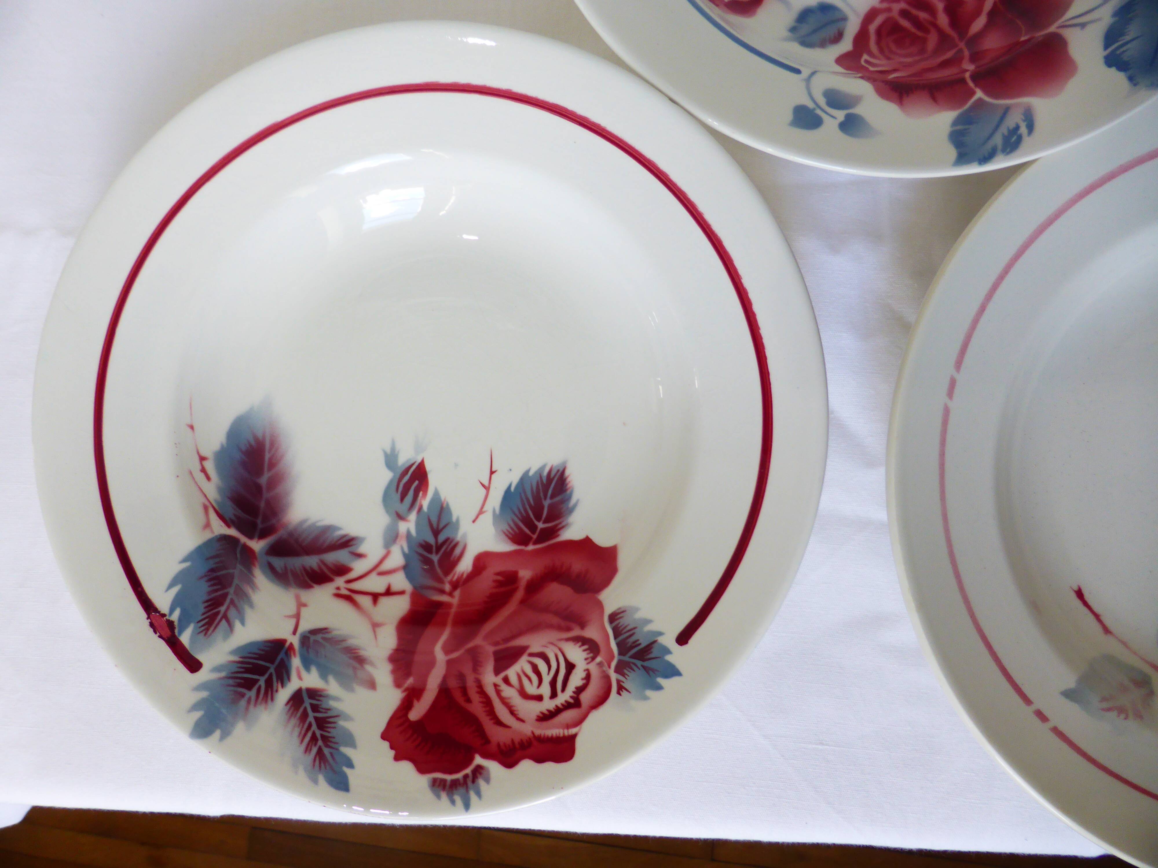 3 vintage soup plates in a jumble