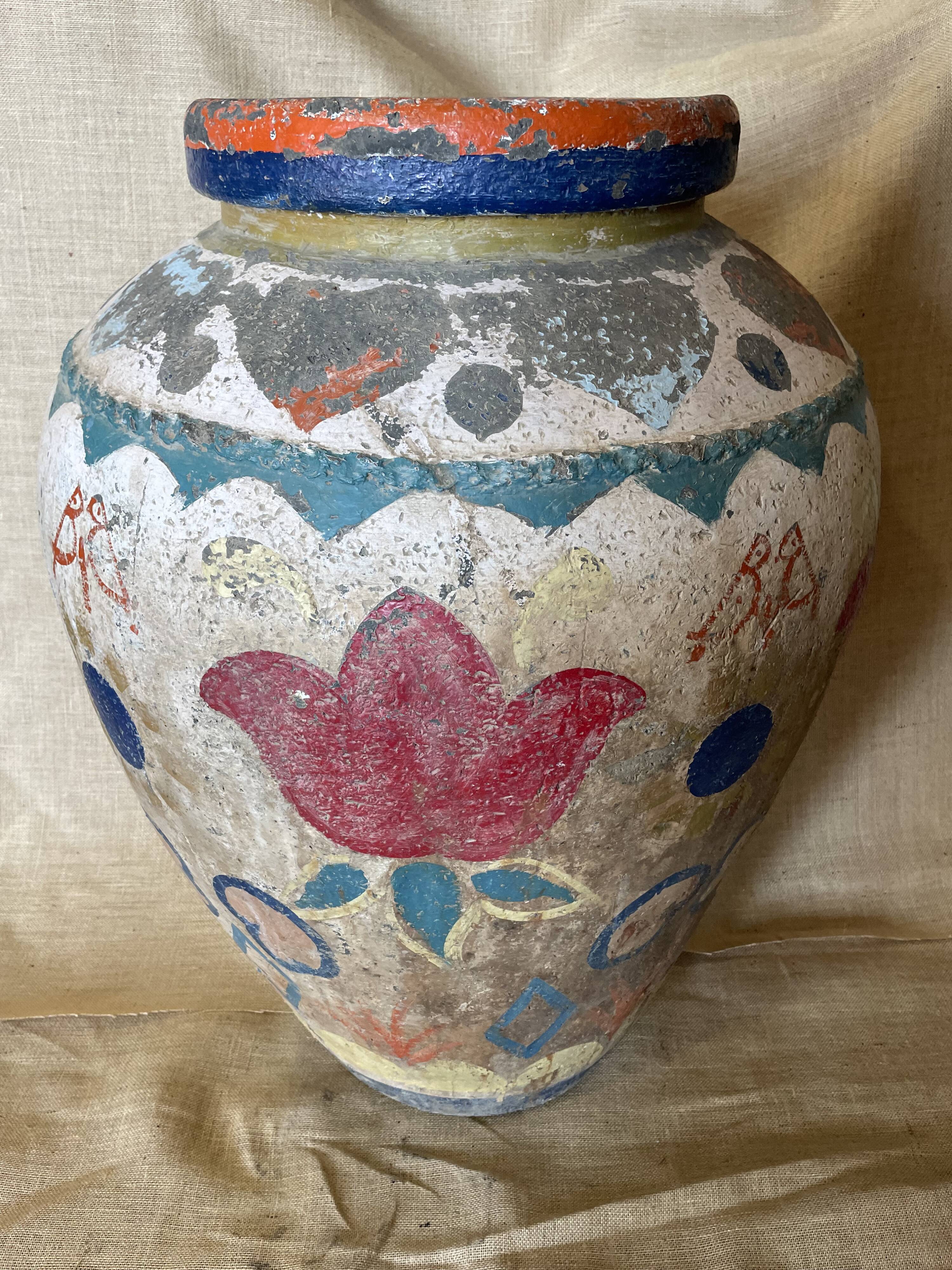 Polychrome decorated terracotta jar