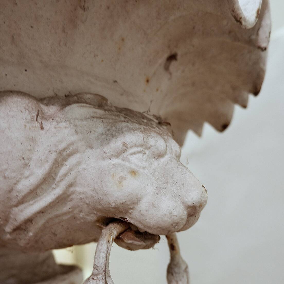 19th century cast iron basin, lion head handles