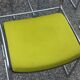 Set of 6 designer chairs with wooden seats and backs, chrome legs.
