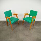 Pair of wood and vinyl armchairs
