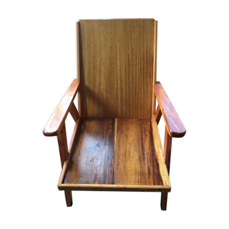 Colonial-style wooden armchair