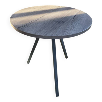 Round wooden table with metal legs