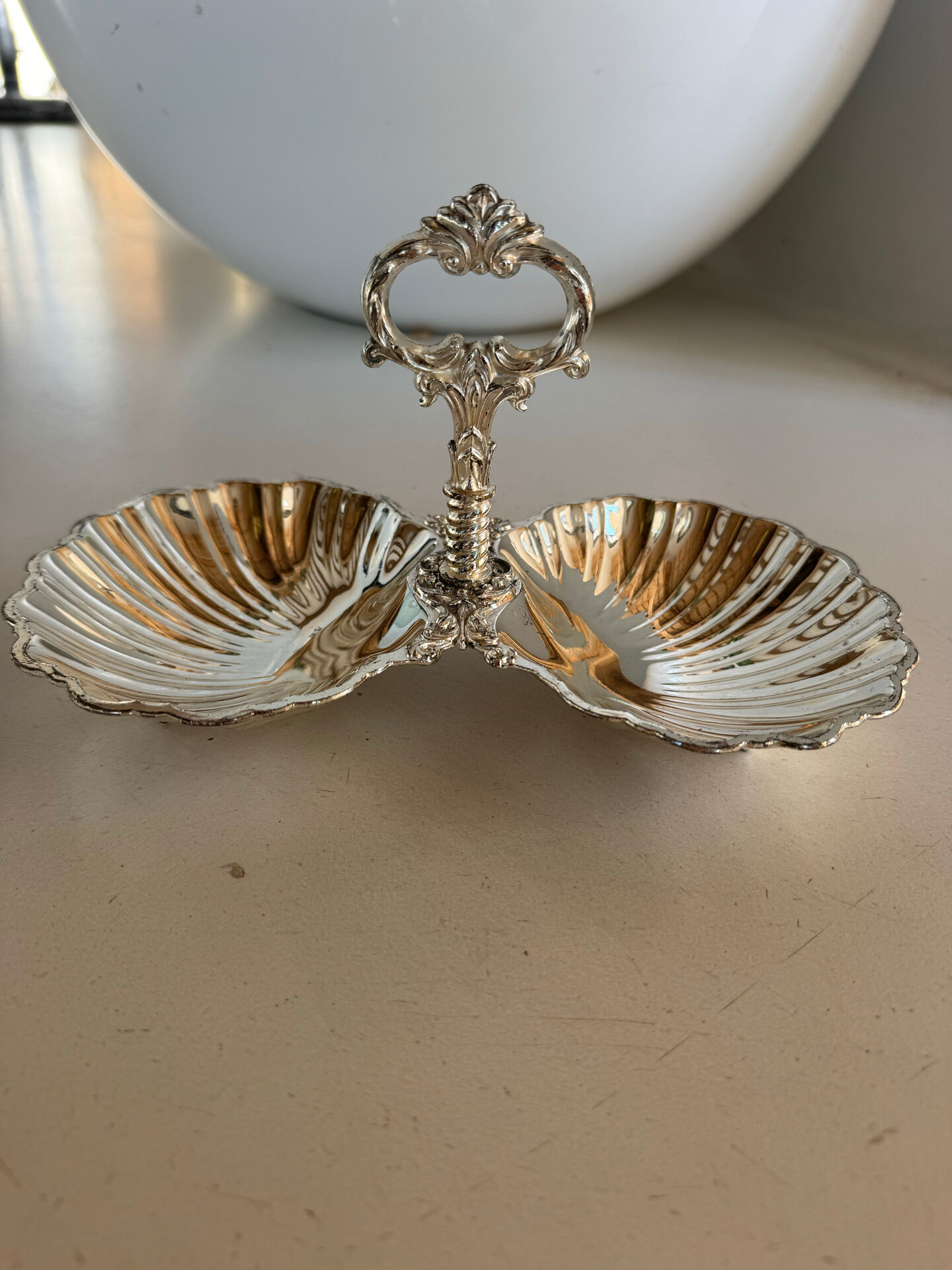 Vintage silver-plated shell display stand