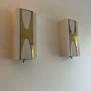 Pair of Loewy wall lights for Hilton, brass and Perspex, France 1965