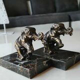 Art Deco Elephant Bookends. In regula on a black veined marble base. Rare model